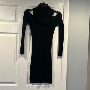 Beautiful long sleeve black dress size medium.